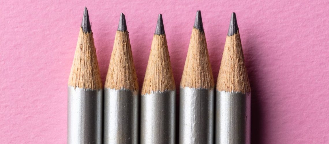 top-view-of-five-silver-wooden-pencils-arranged-in-2025-02-09-20-14-59-utc